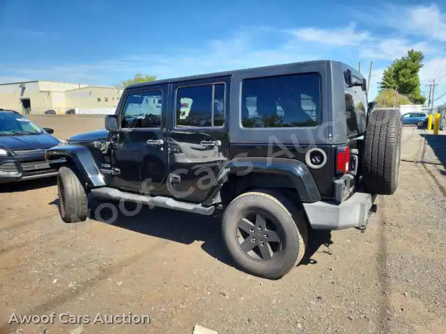 2012 Jeep Wrangler 1C4HJWDGXCL203703 — Copart auction photo 2