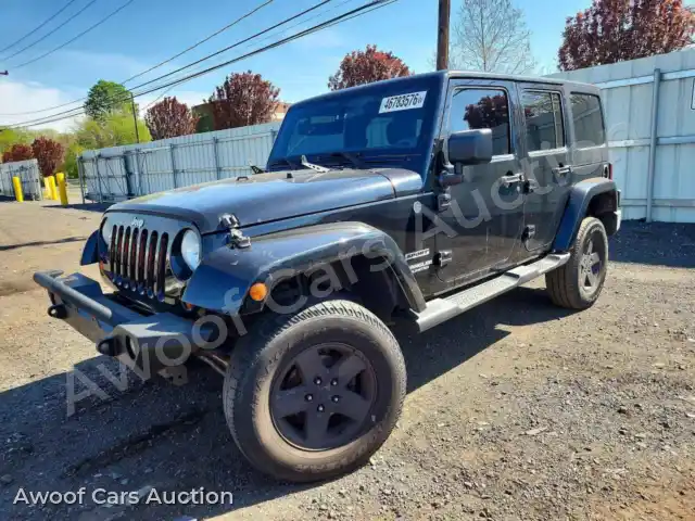 2012 Jeep Wrangler 1C4HJWDGXCL203703 — Copart auction photo 1