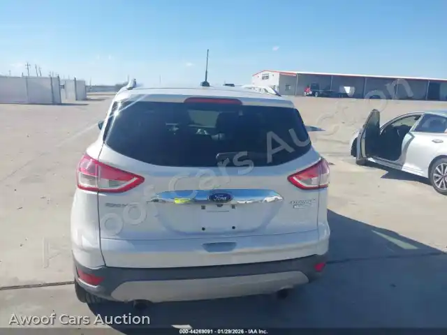 2016 Ford Escape 1FMCU0J97GUB96693 — hoton gwanjo Iaai na 16