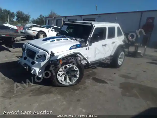 2018 Jeep Wrangler Unlimited 1C4HJXDG7JW324528 — photo 2 de la vente Iaai