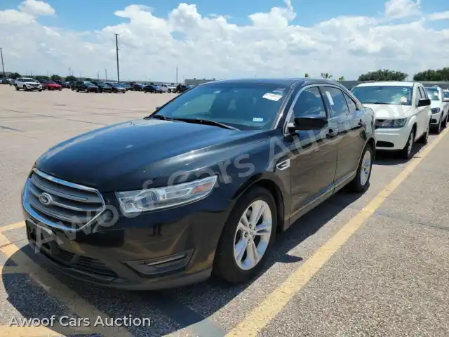 2014 Ford Taurus 1FAHP2E86EG137411 — Manheim auction photo 1