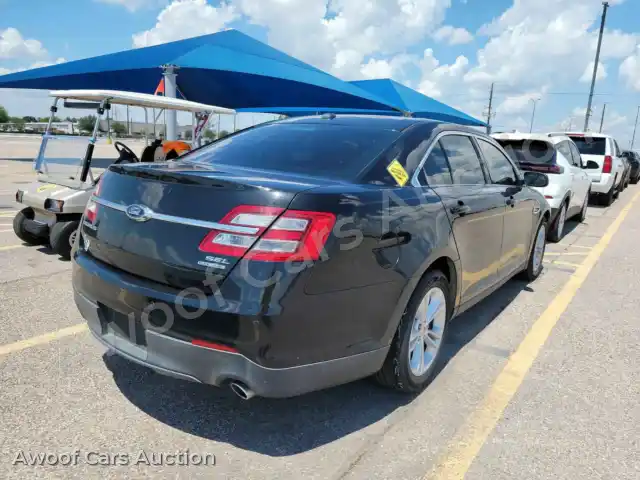2014 Ford Taurus 1FAHP2E86EG137411 — Manheim auction photo 4