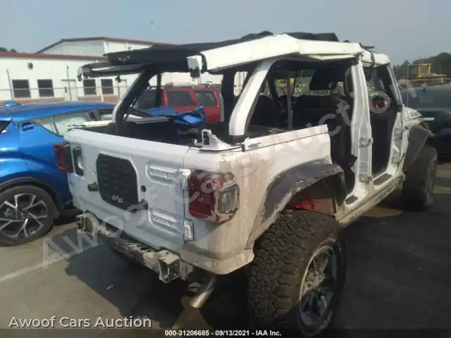 2021 Jeep Wrangler 1C4HJXFG7MW507378 — Iaai auction photo 4