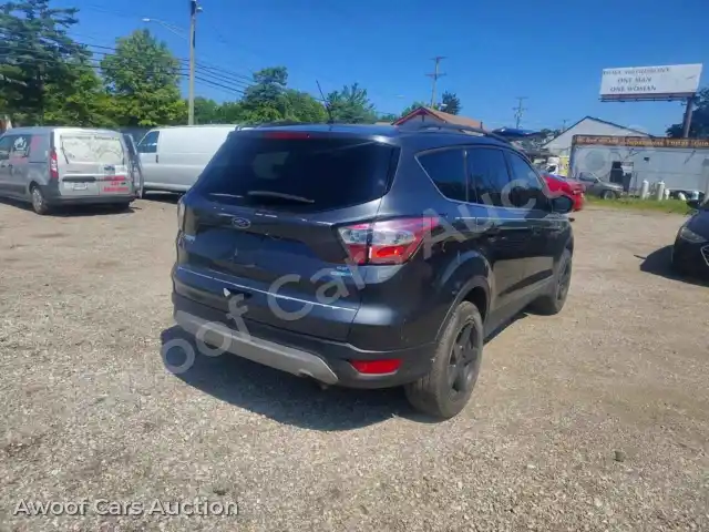 2017 Ford Escape 1FMCU9G90HUC73210 — Copart auction photo 4