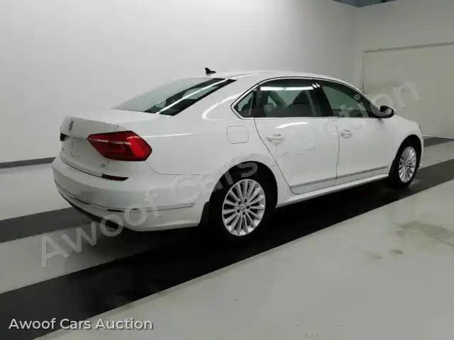2016 Volkswagen Passat 1VWBT7A33GC013333 — Manheim auction photo 4