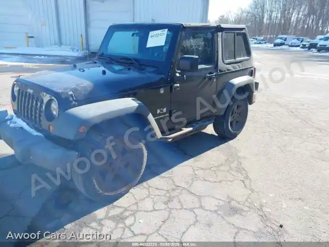 2009 Jeep Wrangler 1J4FA241X9L738982 — Iaai auction photo 2