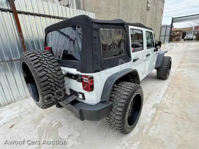 2015 Jeep Wrangler 1C4BJWDG4FL774579 — Copart auction photo 4