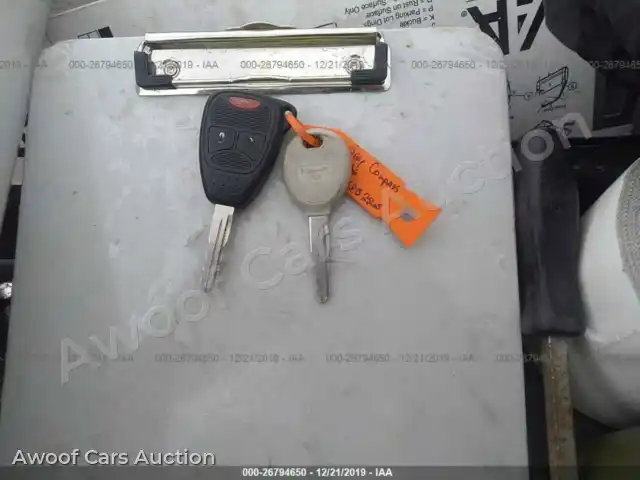 2015 Jeep Compass 1C4NJDBB5FD393102 — hoton gwanjo Iaai na 11