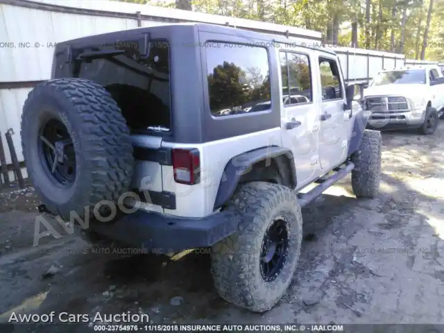 2012 Jeep Wrangler 1C4HJWFGXCL104263 — Iaai auction photo 4