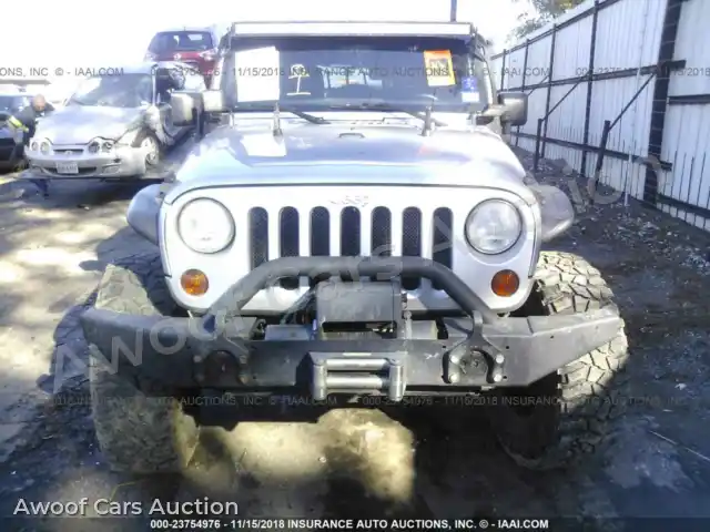 2012 Jeep Wrangler 1C4HJWFGXCL104263 — Iaai auction photo 6