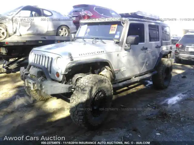 2012 Jeep Wrangler 1C4HJWFGXCL104263 — Iaai auction photo 2