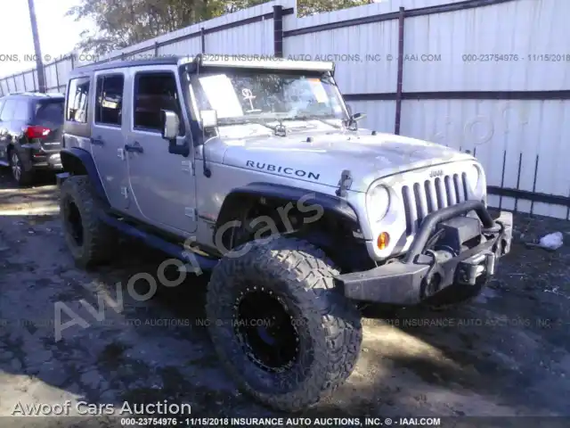 2012 Jeep Wrangler 1C4HJWFGXCL104263 — Iaai auction photo 1