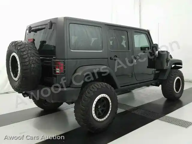 2015 Jeep Wrangler Unlimited 1C4BJWFG6FL650519 — Manheim auction photo 4