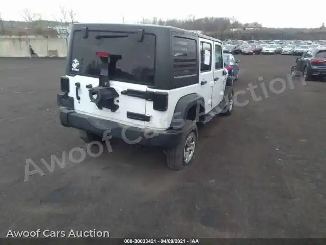 2016 Jeep Wrangler Unlimited 1C4BJWDG9GL339719 — Iaai auction photo 4