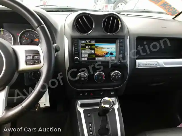 2016 Jeep Compass 1C4NJDEB3GD696683 — hoton gwanjo Manheim na 4
